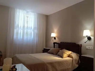 Cama o camas de una habitación en Amplio y tranquilo apartamento casa