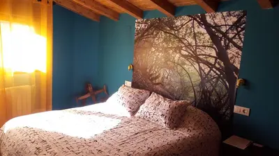 Cama o camas de una habitación en Casa Rural El Peral