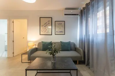 Zona de estar de Apartamentos Turísticos Lulú