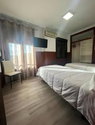 Cama o camas de una habitación en H La Posada