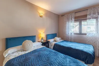 Cama o camas de una habitación en Precioso piso con increíbles vistas en Piedralaves, Tiétar