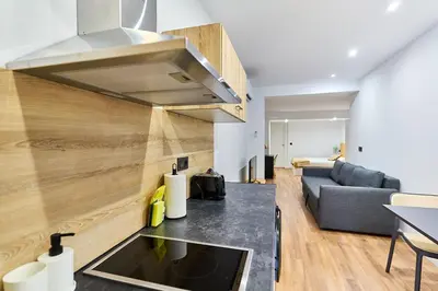 Una cocina o zona de cocina en Apartamentos Beatriz by gaiarooms