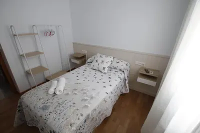 Cama o camas de una habitación en El desván de la vera AT-CC-00848