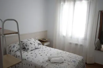 Cama o camas de una habitación en El desván de la vera AT-CC-00848