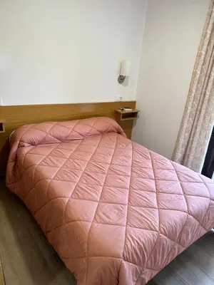 Cama o camas de una habitación en Hostal de Cazalegas