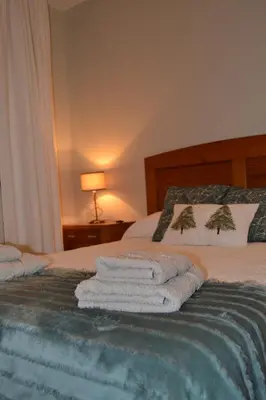 Cama o camas de una habitación en El Balcón de Gredos