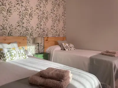 Cama o camas de una habitación en El Balcón de Gredos