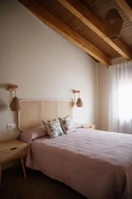 Cama o camas de una habitación en El gallinero de la abuela Claudia