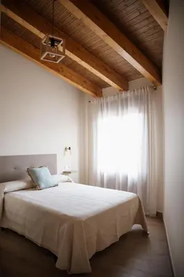 Cama o camas de una habitación en El gallinero de la abuela Claudia