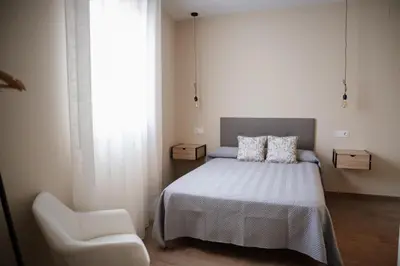 Cama o camas de una habitación en El gallinero de la abuela Claudia