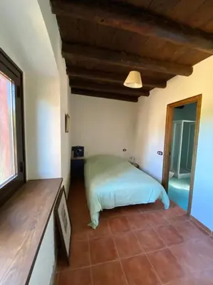 Cama o camas de una habitación en Casa en campo para desconectar en Madrid con Animales