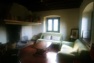 Zona de estar de Casa en campo para desconectar en Madrid con Animales