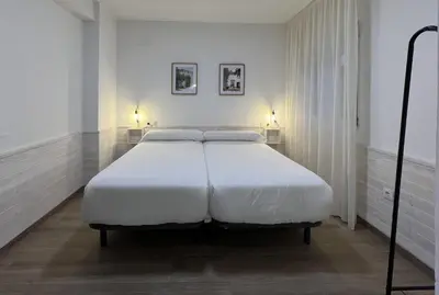 Cama o camas de una habitación en Casa rural Macondo