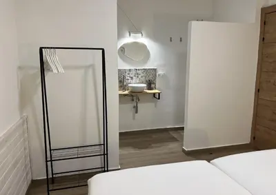 Cama o camas de una habitación en Casa rural Macondo