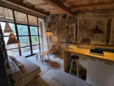 Zona de estar de Casita acceso piscina y jardín La Nueva Candeleda