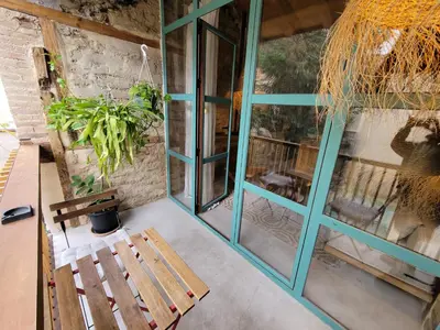 Un balcón o terraza de Casita acceso piscina y jardín La Nueva Candeleda