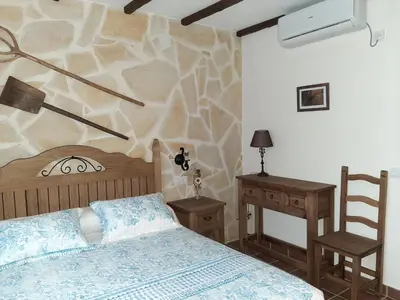 Cama o camas de una habitación en Casa Rural 