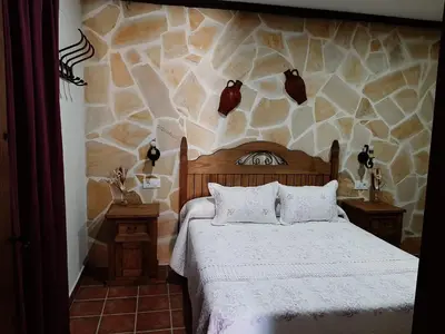 Cama o camas de una habitación en Casa Rural 