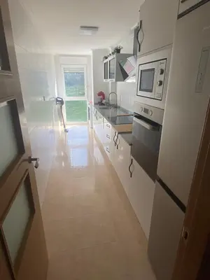 Una cocina o zona de cocina en Casa del Bosque