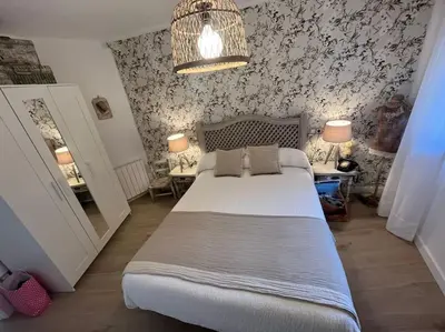 Cama o camas de una habitación en El Capricho de Rosa