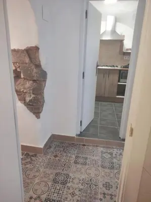 Una cocina o zona de cocina en Apartamento Parte Antigua