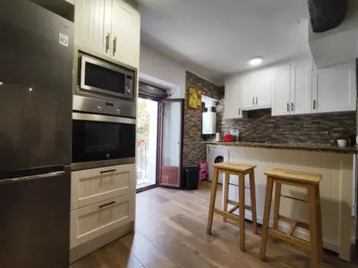 Una cocina o zona de cocina en Solaz del Ambroz Hervas 1