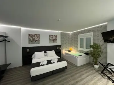 Cama o camas de una habitación en VillaRoygar