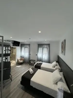 Cama o camas de una habitación en VillaRoygar