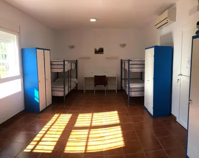 Cama o camas de una habitación en Albergue Peregrinos El Carrascalejo