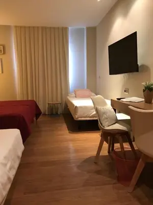 Cama o camas de una habitación en Hotel Entredos