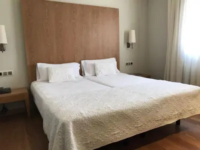 Cama o camas de una habitación en Hotel Entredos