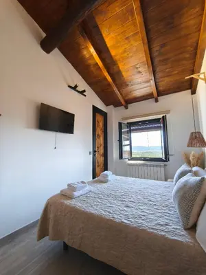 Cama o camas de una habitación en La Cabaña27