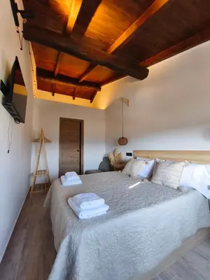 Cama o camas de una habitación en La Cabaña27