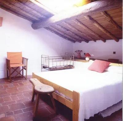 Cama o camas de una habitación en Posada de Amonaria