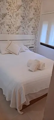 Cama o camas de una habitación en El Refugio de Rosa