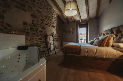 Cama o camas de una habitación en La casa del Mayoral
