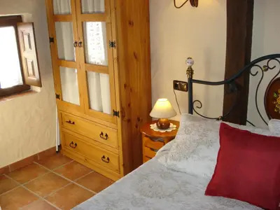 Cama o camas de una habitación en Apartamentos Azahar