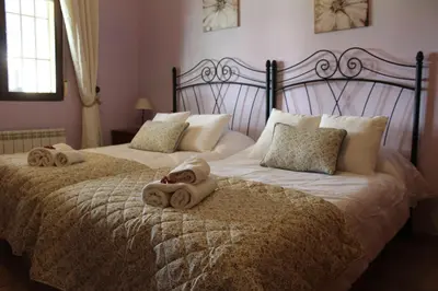 Cama o camas de una habitación en La Huertarrona