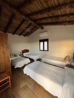 Cama o camas de una habitación en Casa Rural Granja Abril