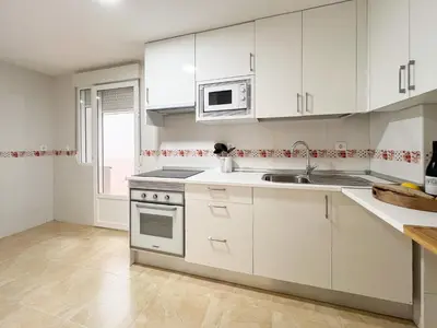Una cocina o zona de cocina en TAYP San Marcos 102