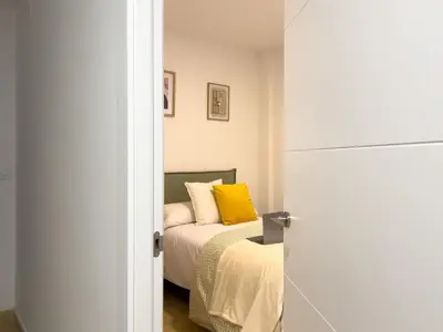 Cama o camas de una habitación en TAYP San Marcos 103