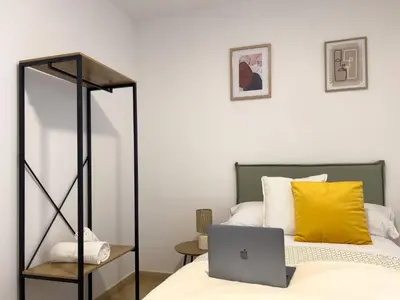 Cama o camas de una habitación en TAYP San Marcos 103