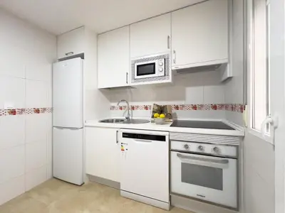 Una cocina o zona de cocina en TAYP San Marcos 103