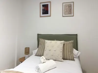 Cama o camas de una habitación en TAYP San Marcos 104