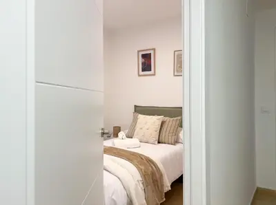Cama o camas de una habitación en TAYP San Marcos 104