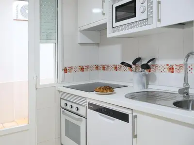 Una cocina o zona de cocina en TAYP San Marcos 104