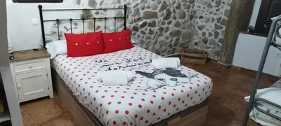 Cama o camas de una habitación en El respiro de Candeleda