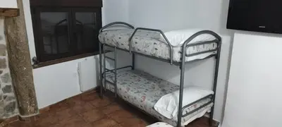 Cama o camas de una habitación en El respiro de Candeleda