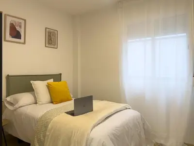 Cama o camas de una habitación en TAYP San Marcos 106