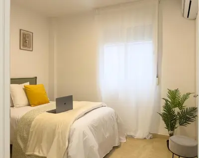 Cama o camas de una habitación en TAYP San Marcos 106